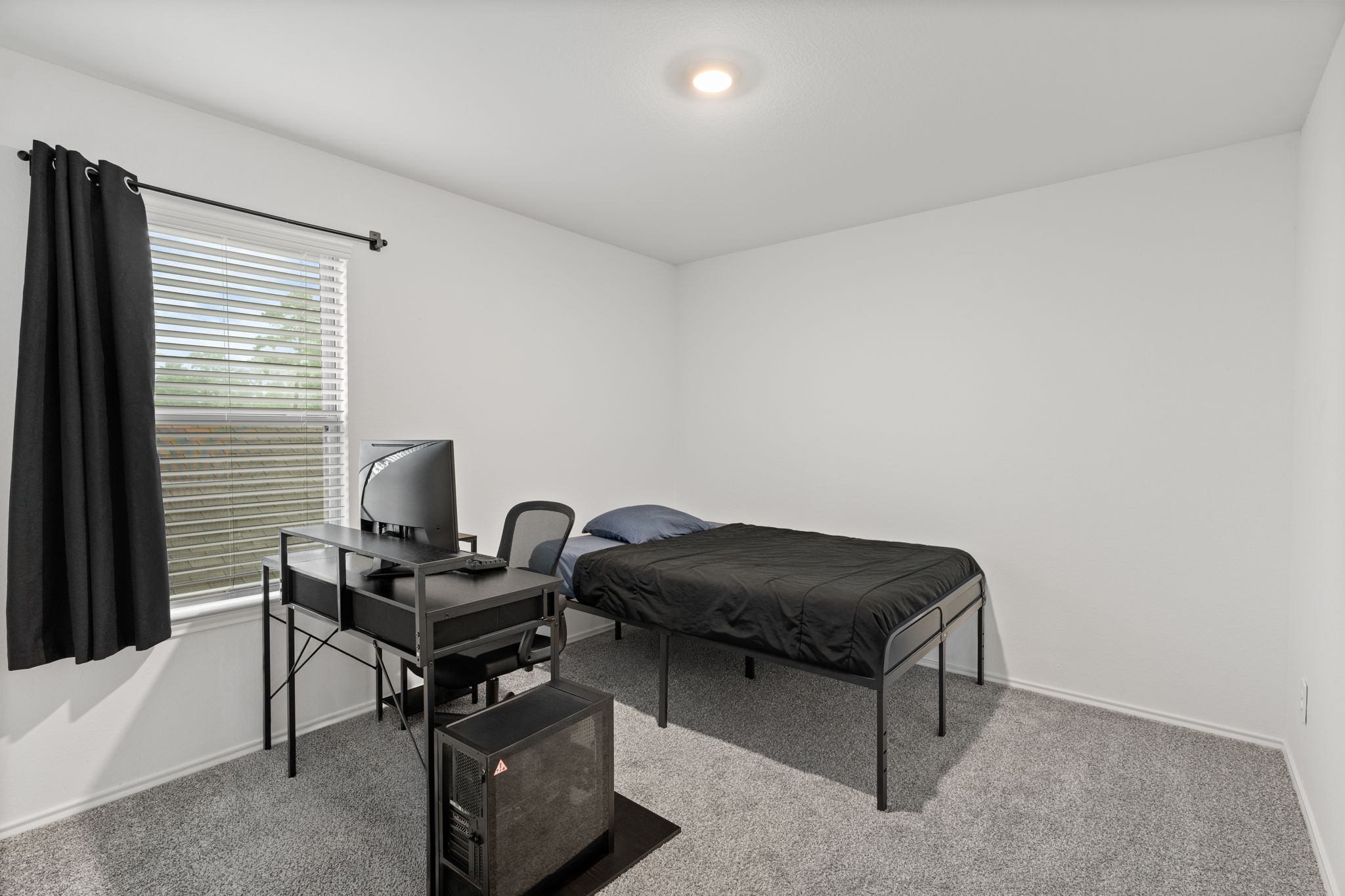 22306 Forest Gorge Lane Spring, TX 77373 - Photo 18 of 26 a room with a couch and a window