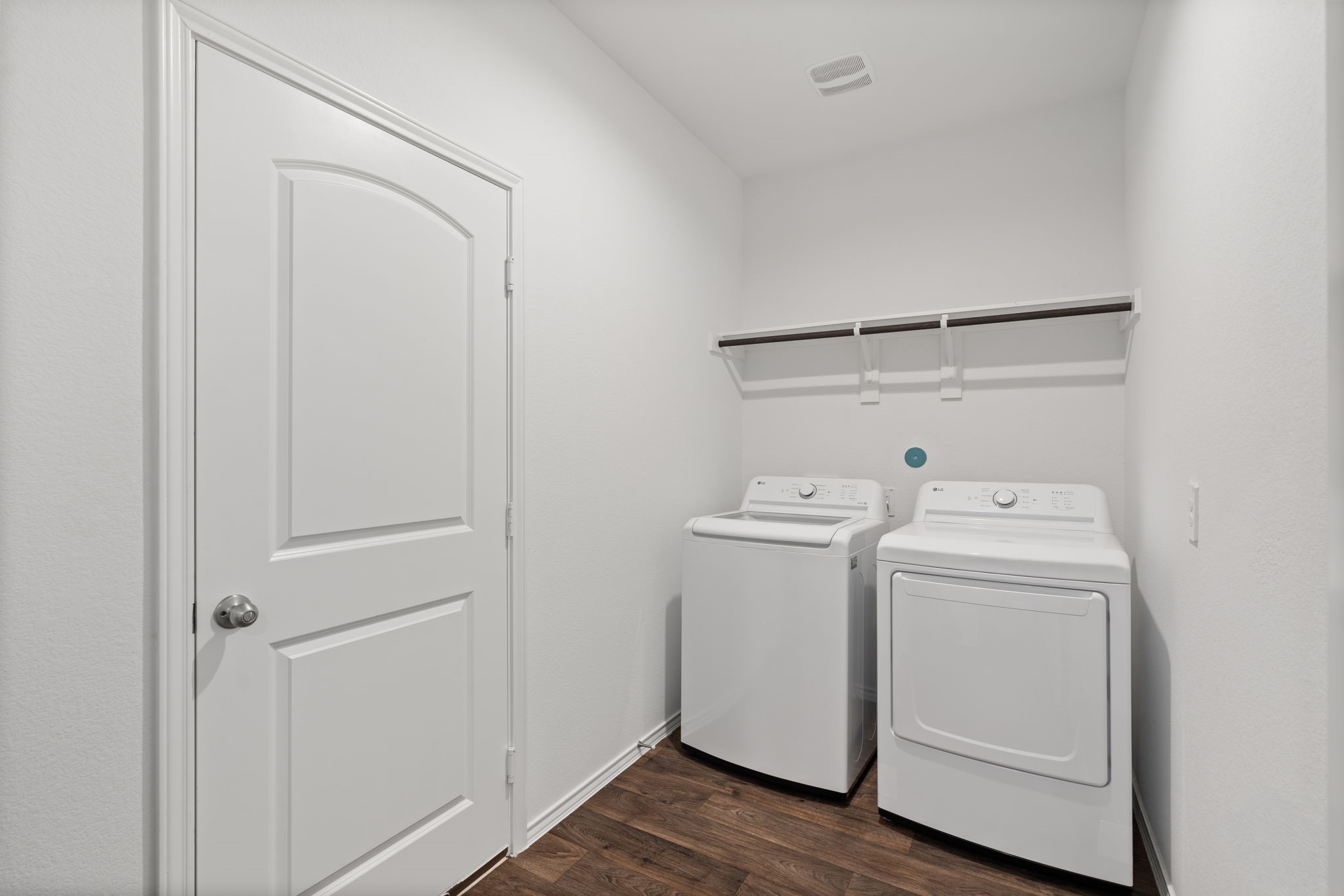 22306 Forest Gorge Lane Spring, TX 77373 - Photo 8 of 26 a utility room with dryer and washer