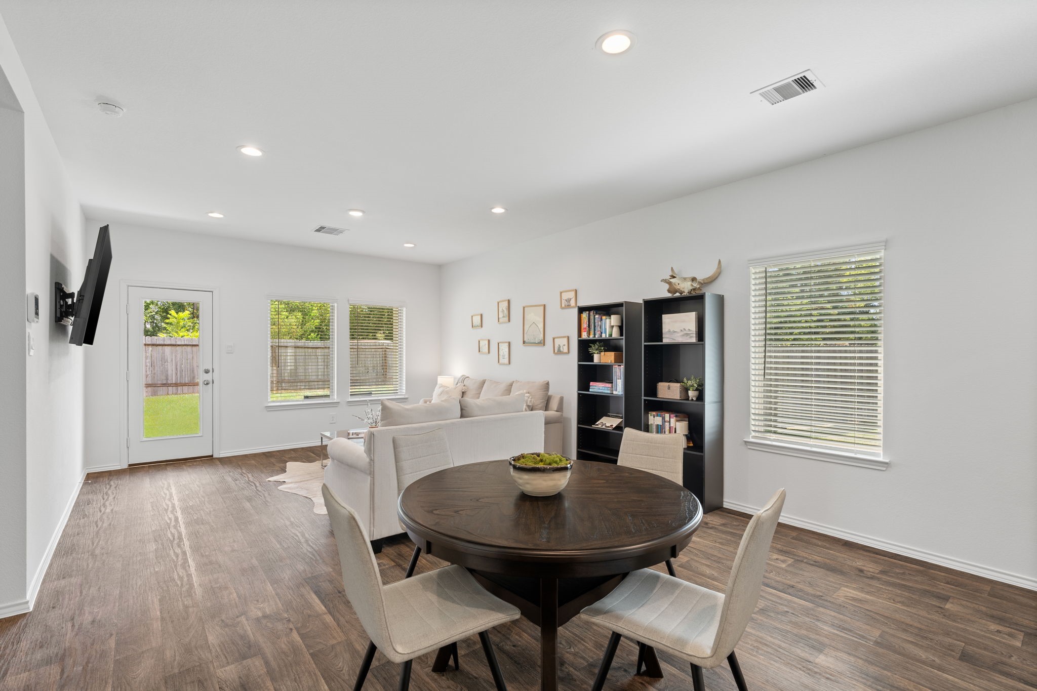 22306 Forest Gorge Lane Spring, TX 77373 - Photo 10 of 26 a view of a dining room with furniture and window