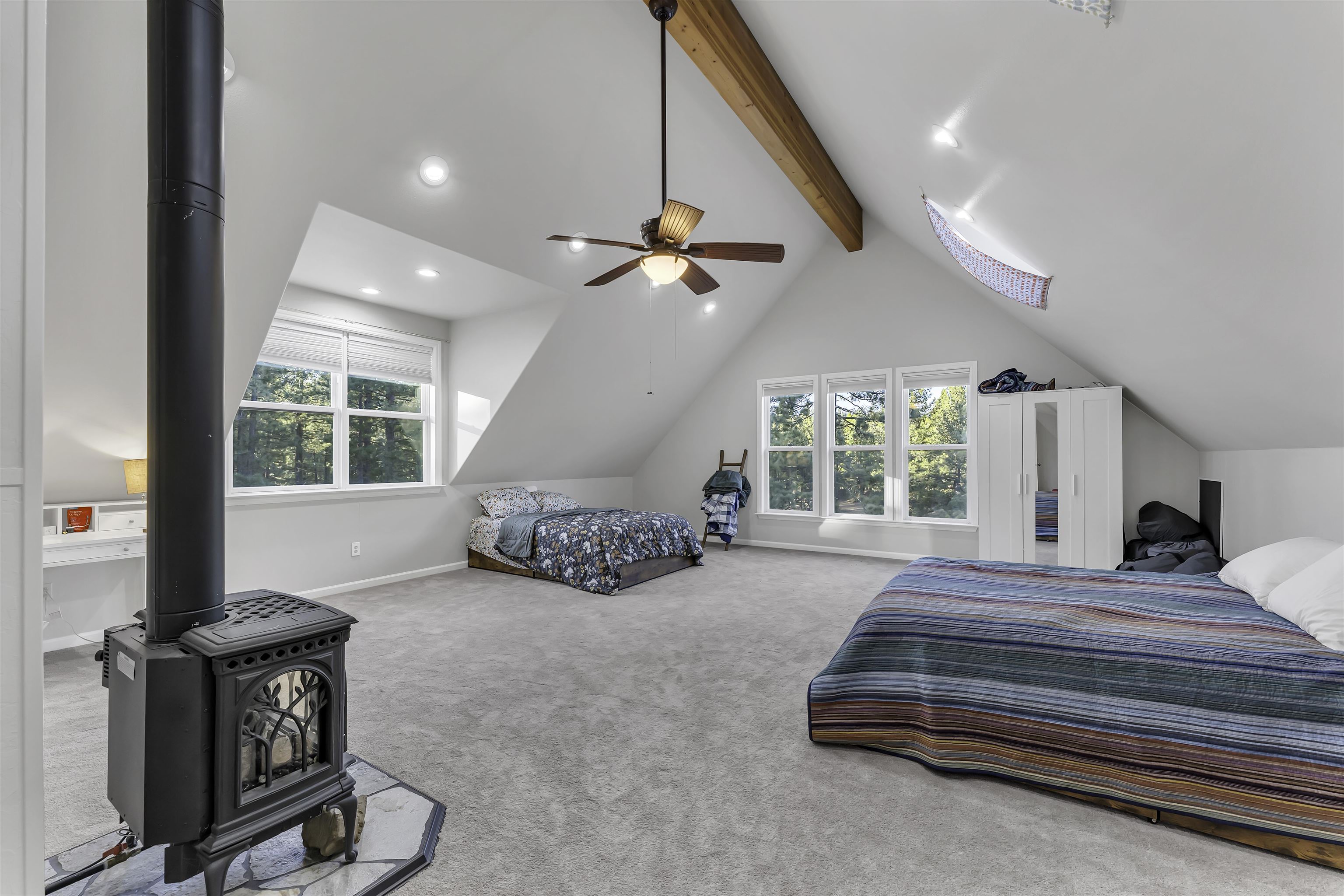 1341 Valley Ranch Drive Clio, CA 96106 - Photo 30 of 50 a bedroom with furniture and a large window