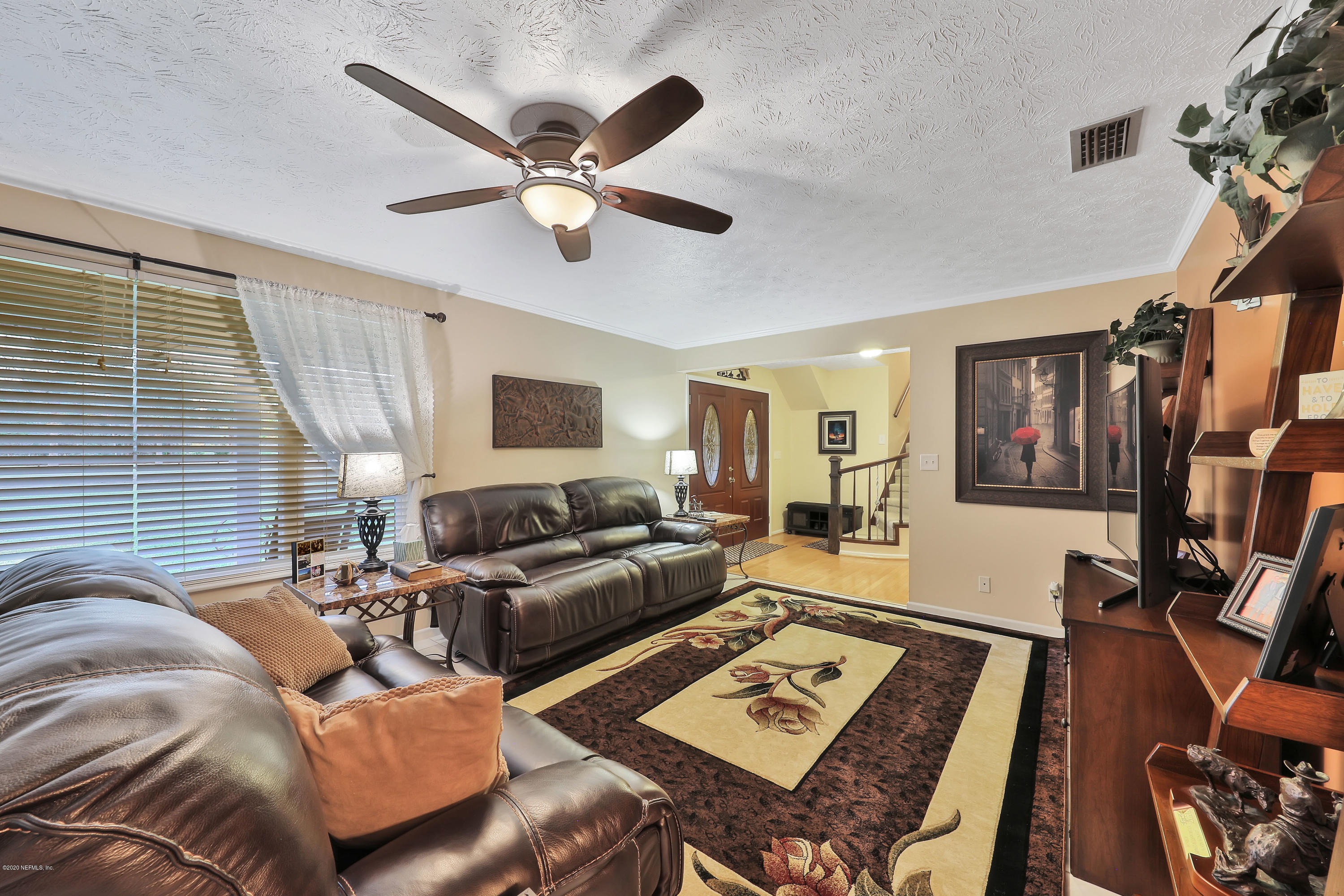 746 Worth Road St. Johns, FL 32259 - Photo 9 of 66 Foyer into family room