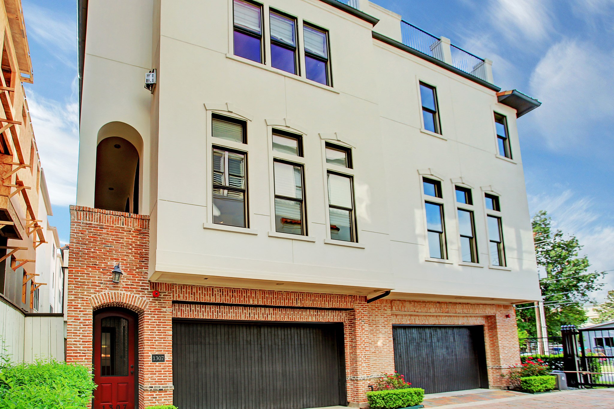 1307 Rosedale Street Houston, TX 77004 - Photo 2 of 32 a front view of a building with a entrance
