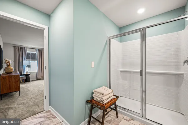 a view of room with window and bathroom