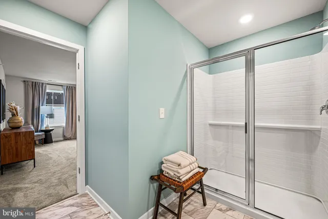 a bedroom with a bed and a cabinets