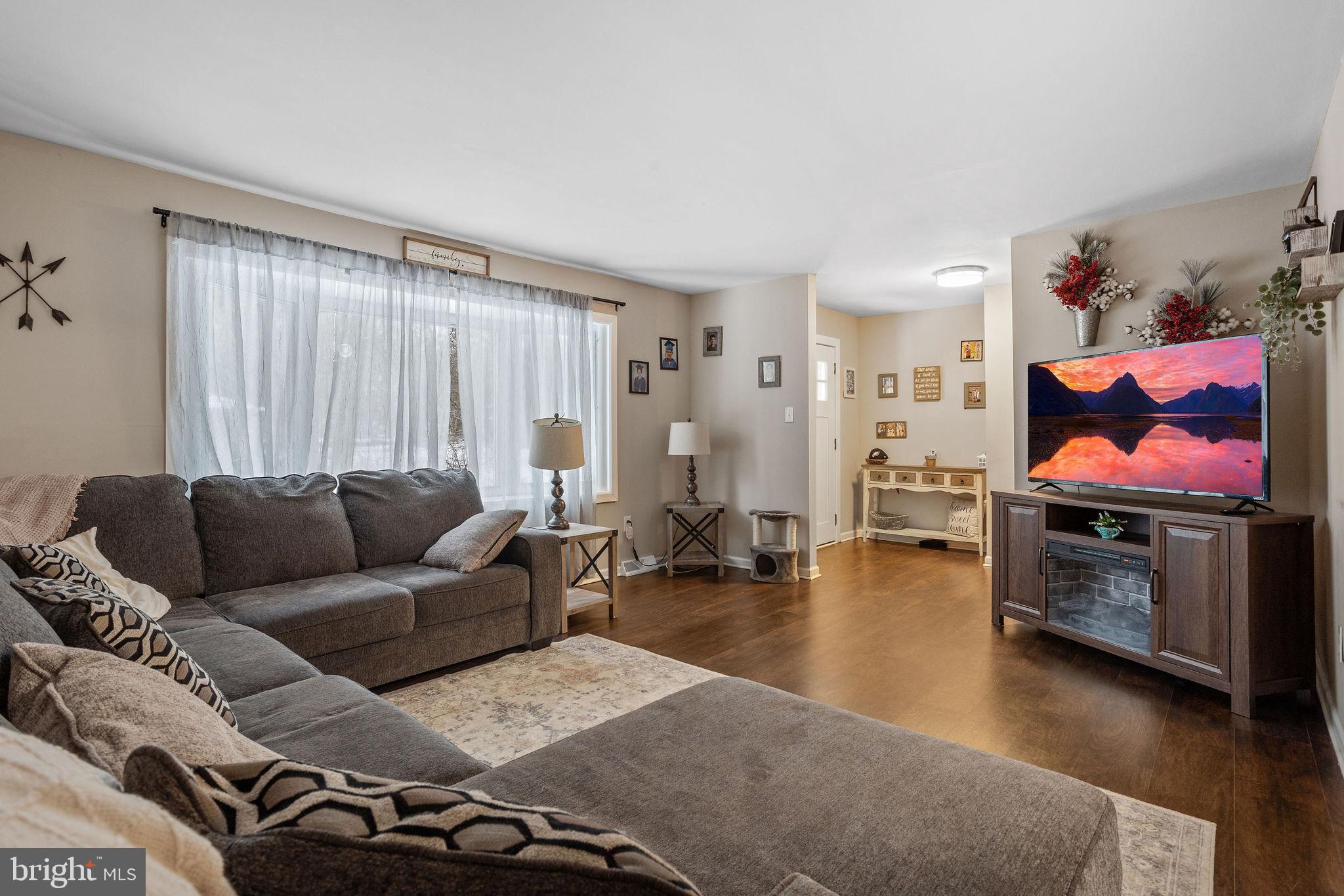 1 Ruby Avenue Sewell, NJ 08080 - Photo 12 of 32 a living room with furniture and a flat screen tv