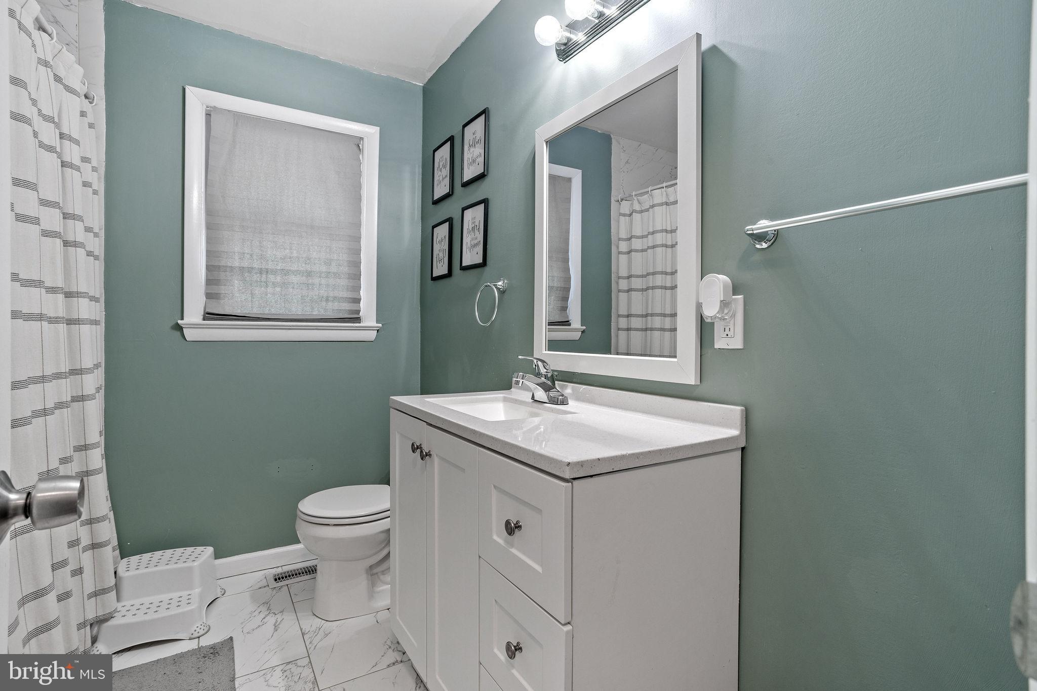 1 Ruby Avenue Sewell, NJ 08080 - Photo 19 of 32 a spacious bathroom with a sink toilet and mirror