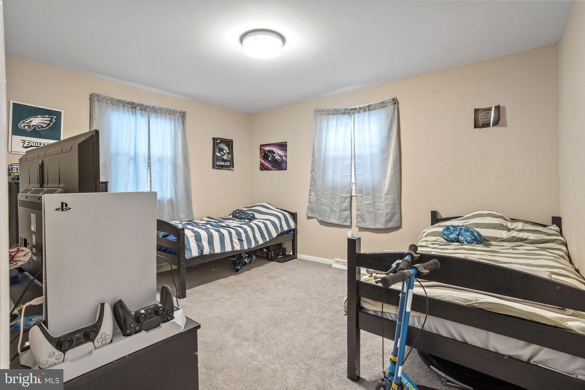 1 Ruby Avenue Sewell, NJ 08080 - Photo 25 of 32 a bedroom with a bed and a table