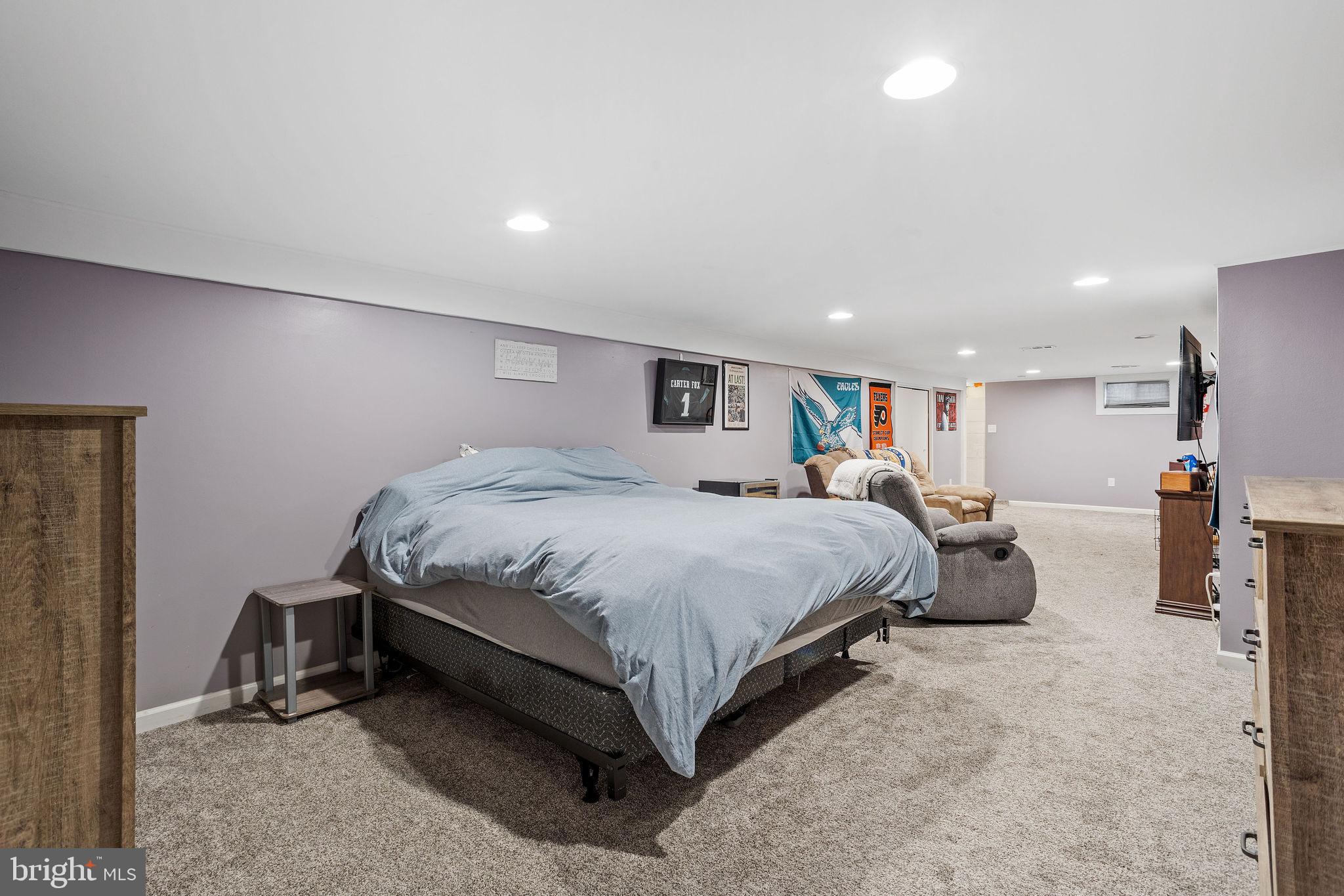 1 Ruby Avenue Sewell, NJ 08080 - Photo 28 of 32 a spacious bedroom with a bed and a couch