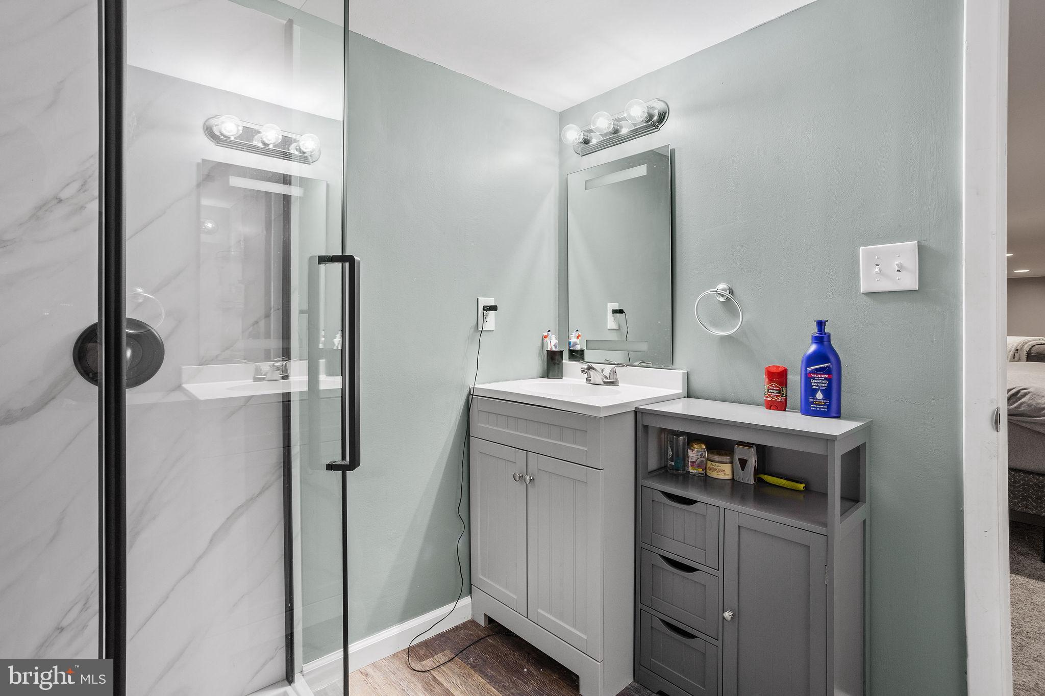 1 Ruby Avenue Sewell, NJ 08080 - Photo 30 of 32 a kitchen with a sink and a mirror