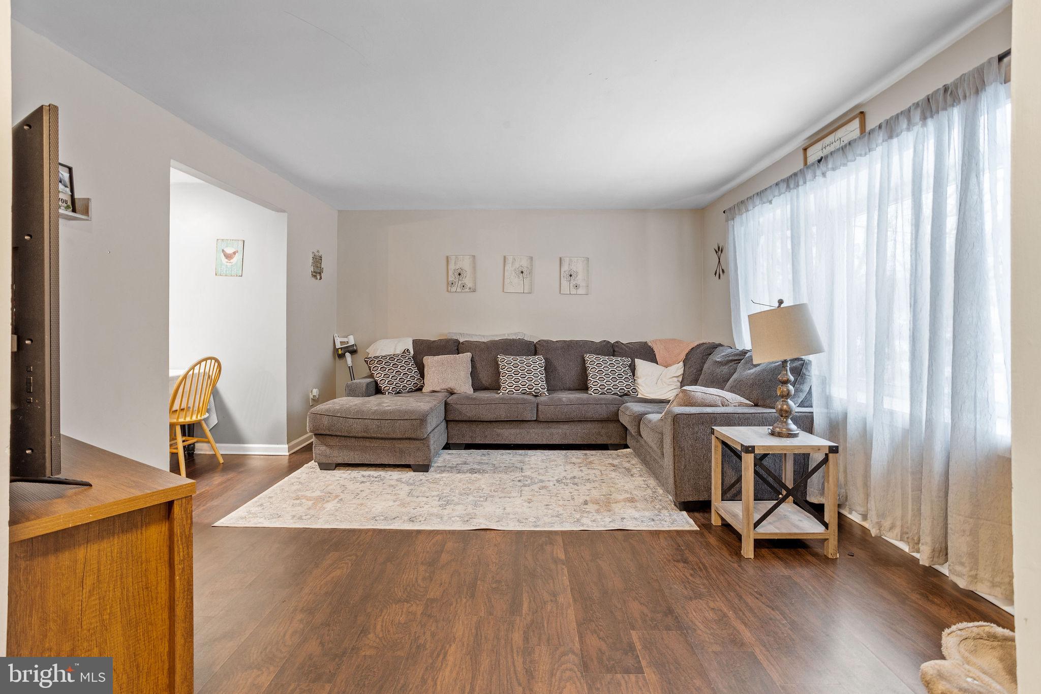1 Ruby Avenue Sewell, NJ 08080 - Photo 10 of 32 a living room with furniture and a wooden floor