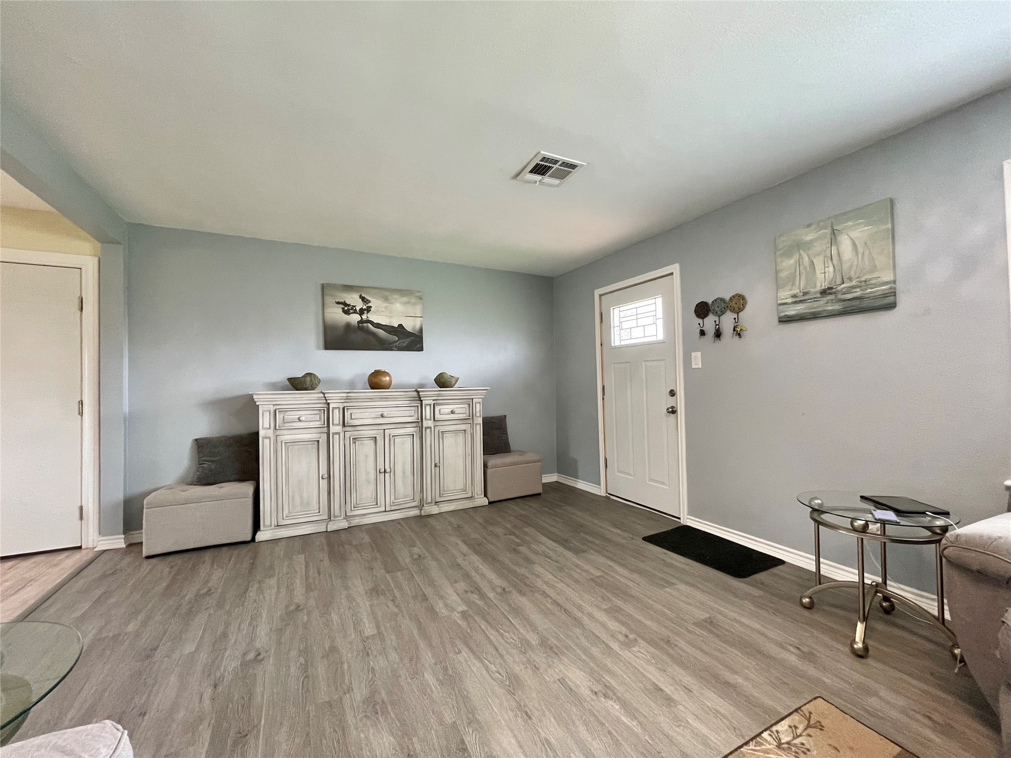 1116 Lake Street Clute, TX 77531 - Photo 5 of 34 a view of kitchen with furniture and wooden floor