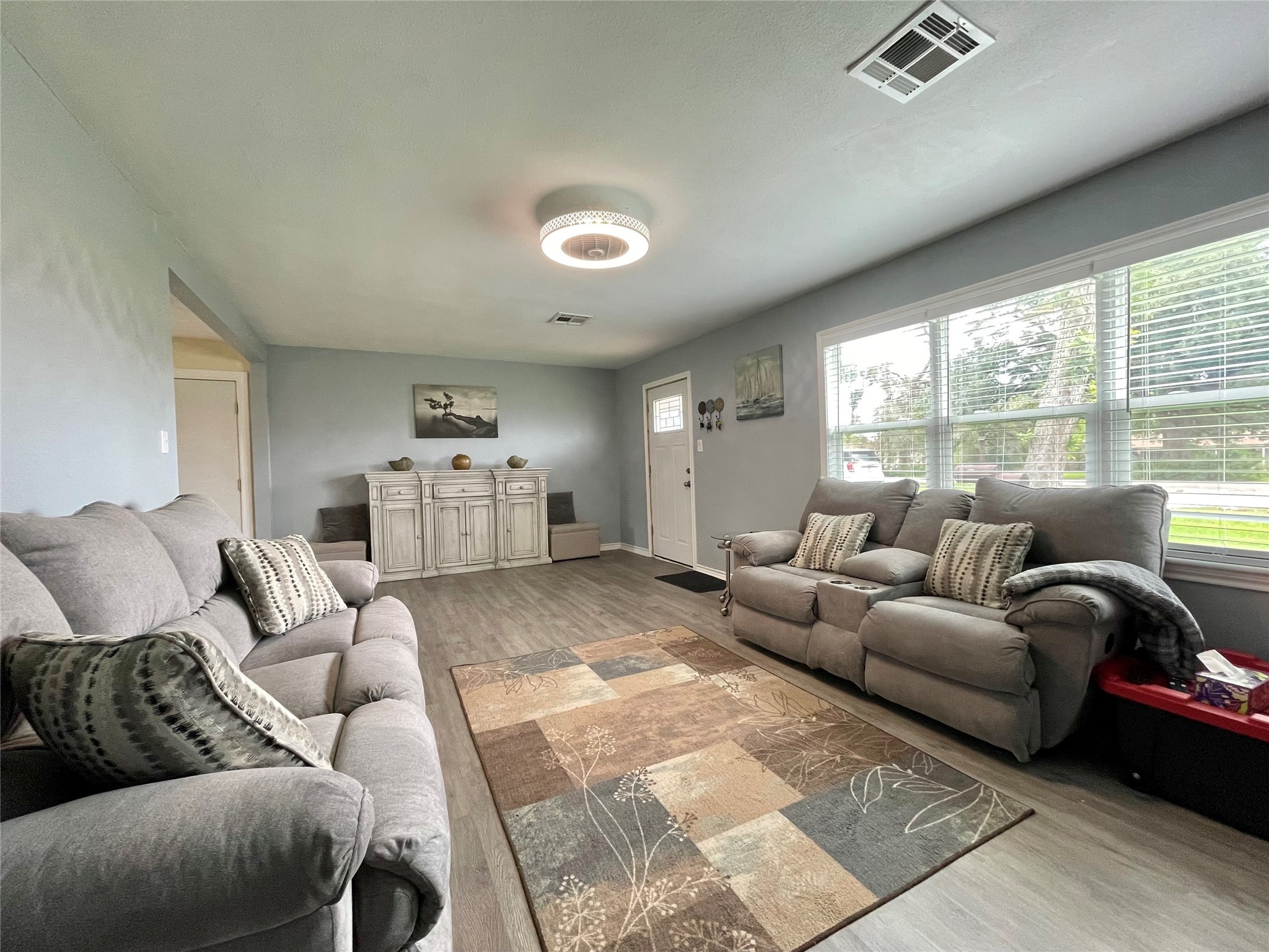 1116 Lake Street Clute, TX 77531 - Photo 7 of 34 a living room with furniture and a large window