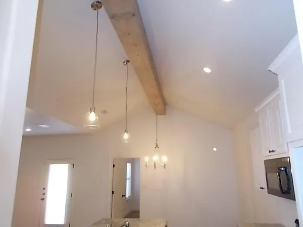 a view of a kitchen and a window