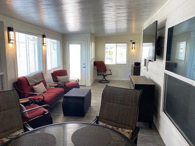 84136 Ave 44, Unit 694 Indio, CA 92203 - Photo 12 of 20 a living room with furniture and a large window