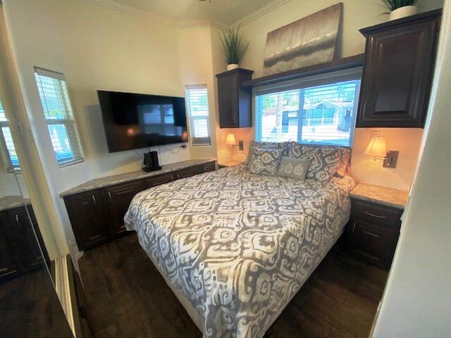 84136 Ave 44, Unit 694 Indio, CA 92203 - Photo 16 of 20 a bed sitting in a bedroom next to a window