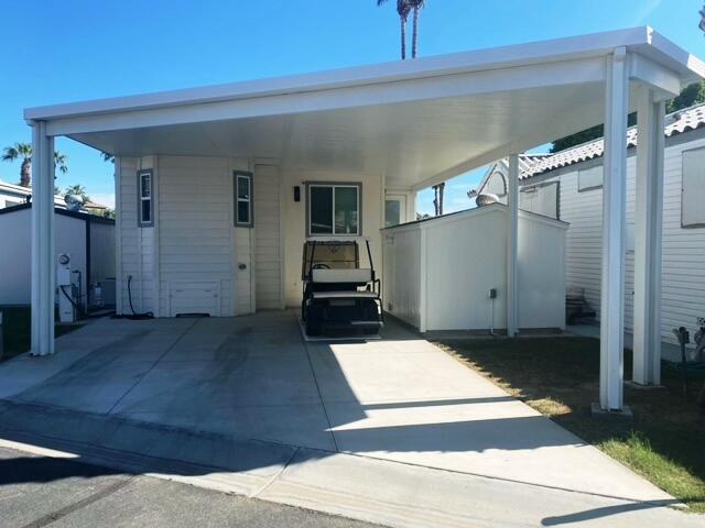 84136 Ave 44, Unit 694 Indio, CA 92203 - Photo 2 of 20 a view of a back yard of the house