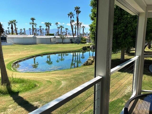 84136 Ave 44, Unit 694 Indio, CA 92203 - Photo 8 of 20 a view of swimming pool from a balcony
