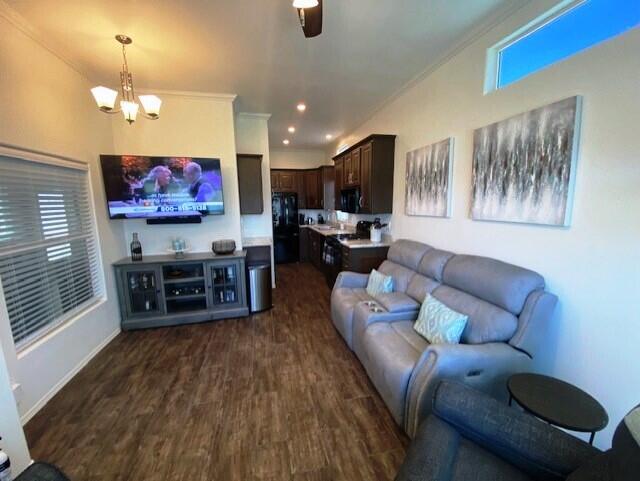 84136 Ave 44, Unit 694 Indio, CA 92203 - Photo 10 of 20 a living room with furniture and a flat screen tv