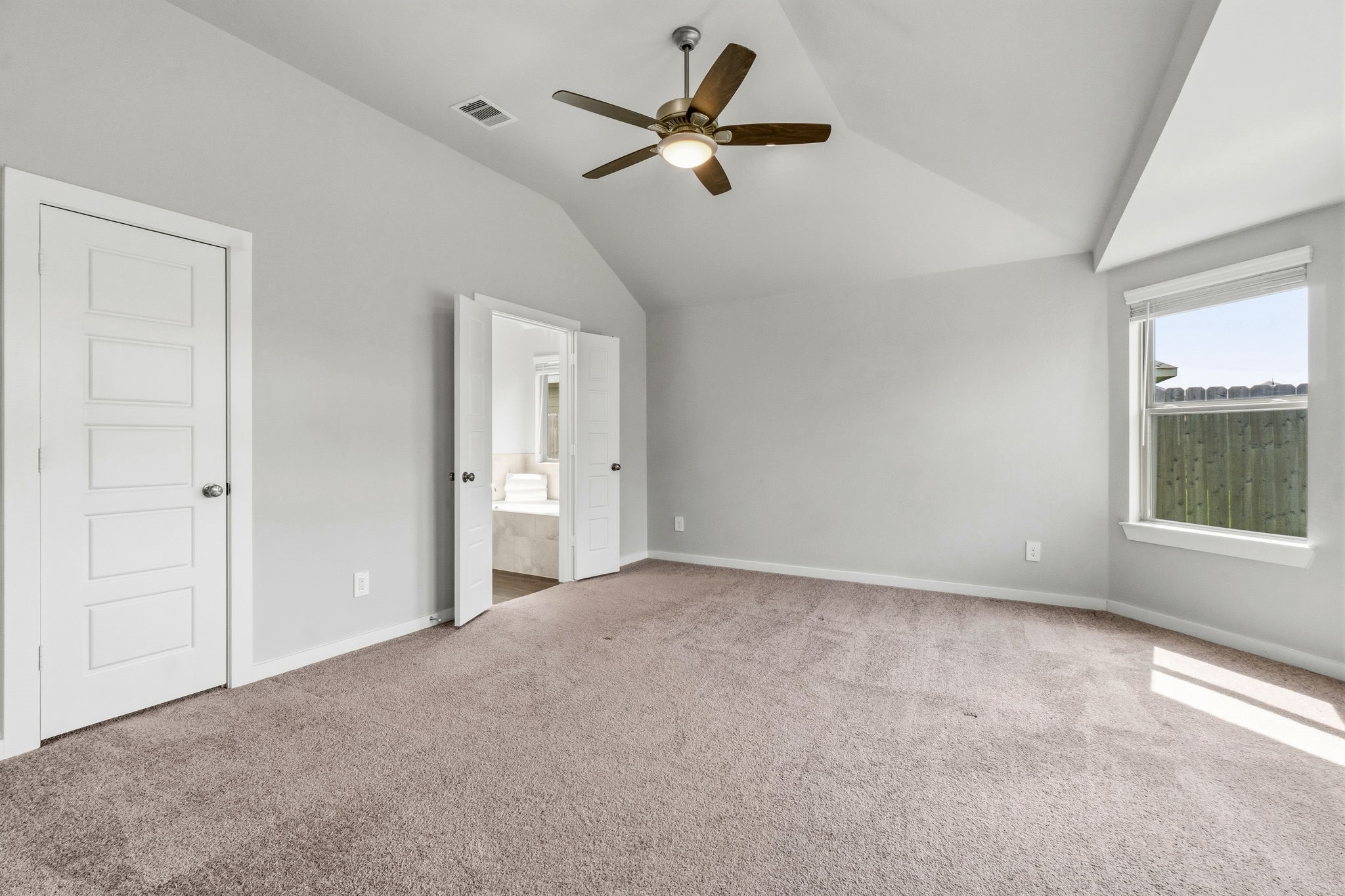 22235 Cardinal Crest Lane New Caney, TX 77357 - Photo 12 of 41 Spacious primary suite featuring a beautiful bay window sitting area.