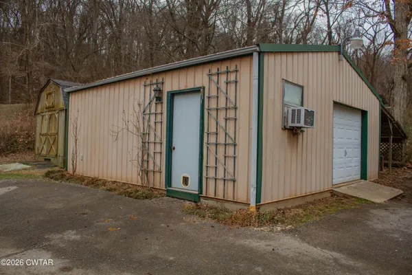 a view of a back yard of the house