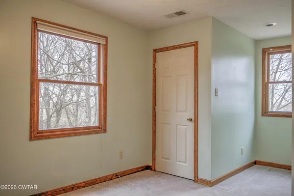 wooden floor and windows in a room