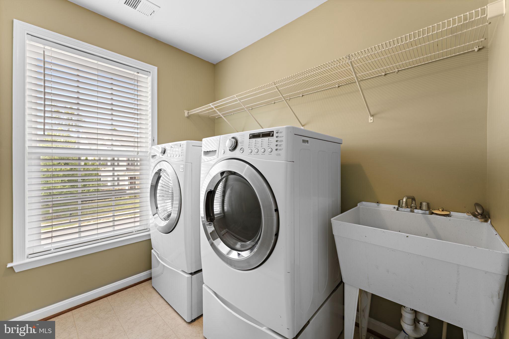 42441 Nickens Place Ashburn, VA 20148 - Photo 29 of 61 Upper Level Laundry Room