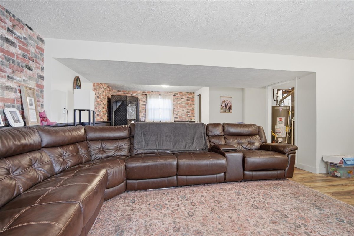 308 Columbia Drive Normal, IL 61761 - Photo 19 of 30 a living room with a couch and a couch