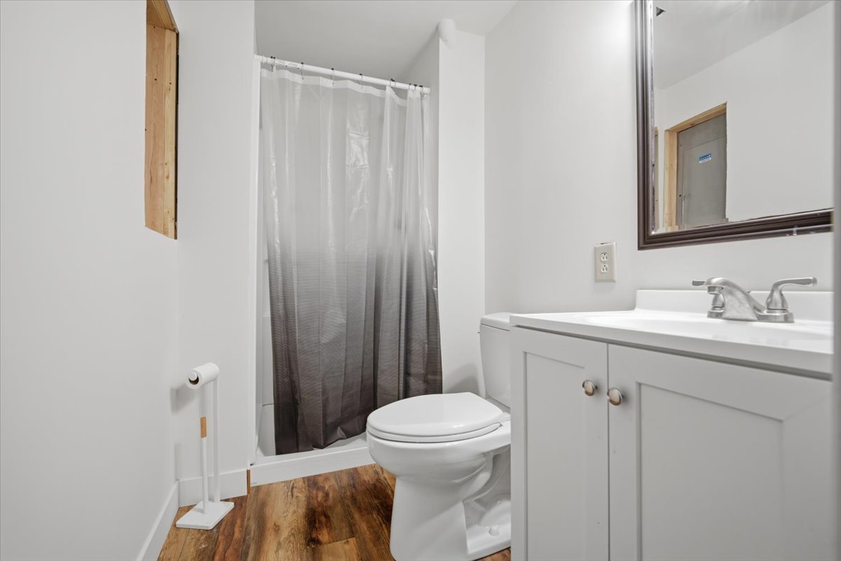 308 Columbia Drive Normal, IL 61761 - Photo 22 of 30 a bathroom with a sink a toilet and shower