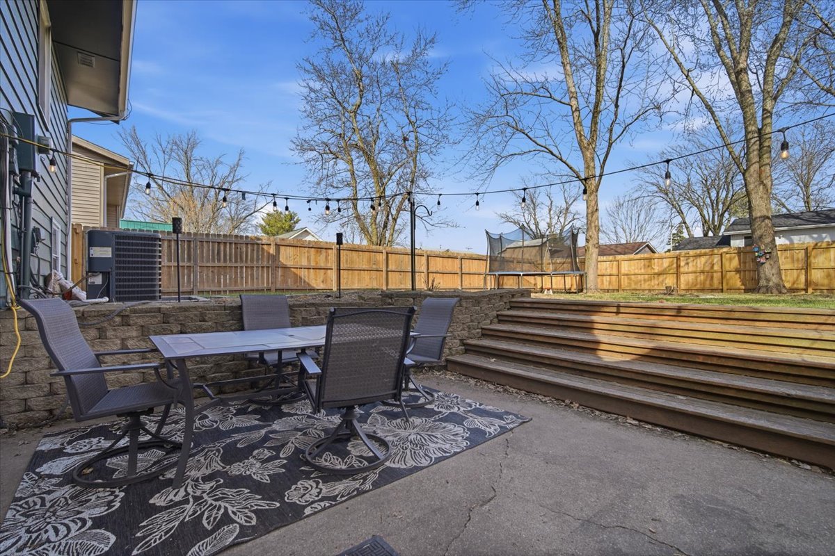 308 Columbia Drive Normal, IL 61761 - Photo 27 of 30 a view of a patio with iron fence