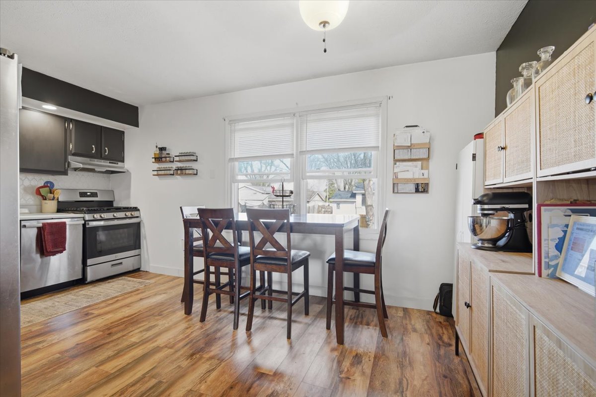 308 Columbia Drive Normal, IL 61761 - Photo 6 of 30 a view of a dining room with furniture kitchen and wooden floor