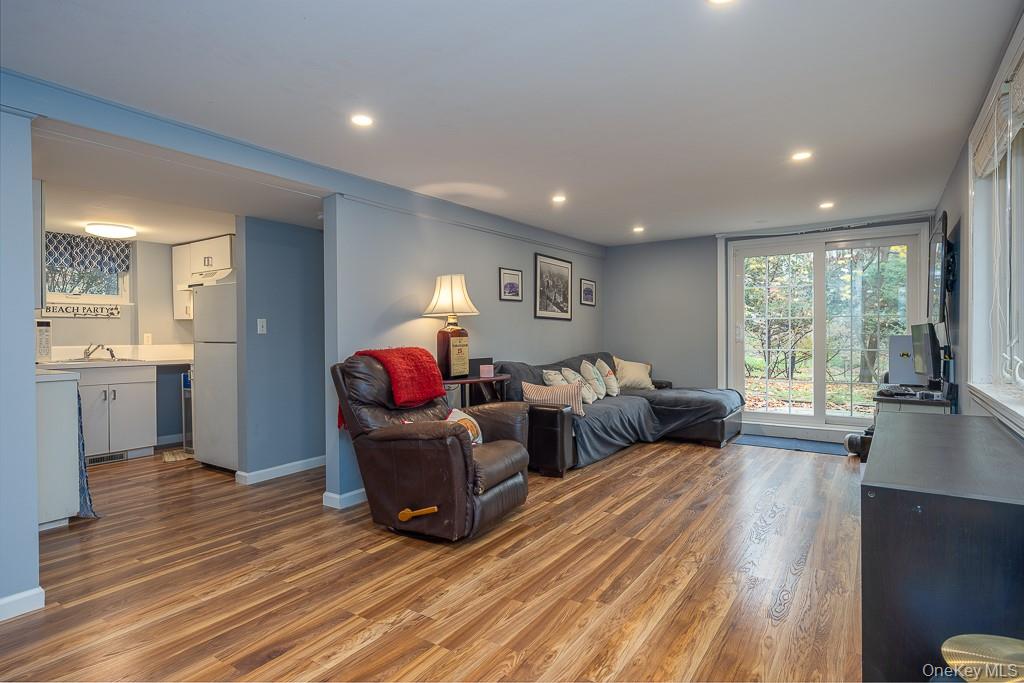 101 Hickory Hill Road Tappan, NY 10983 - Photo 24 of 40 a living room with furniture and a wooden floor