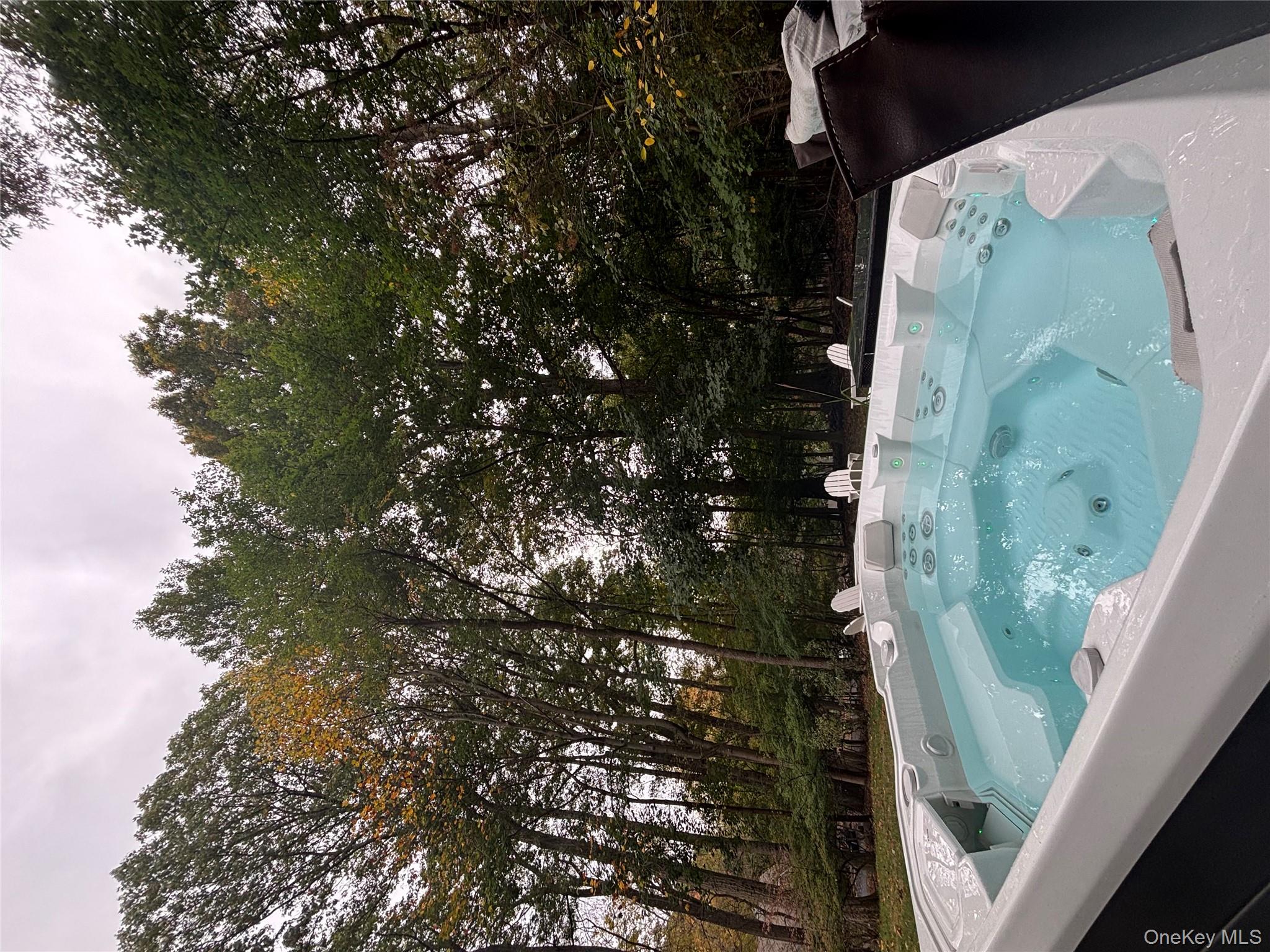 101 Hickory Hill Road Tappan, NY 10983 - Photo 29 of 40 a view of a wooden deck with a yard