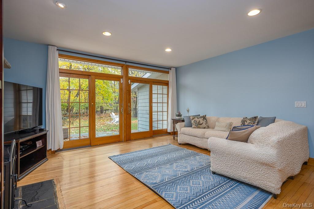 101 Hickory Hill Road Tappan, NY 10983 - Photo 10 of 40 a living room with furniture and a flat screen tv