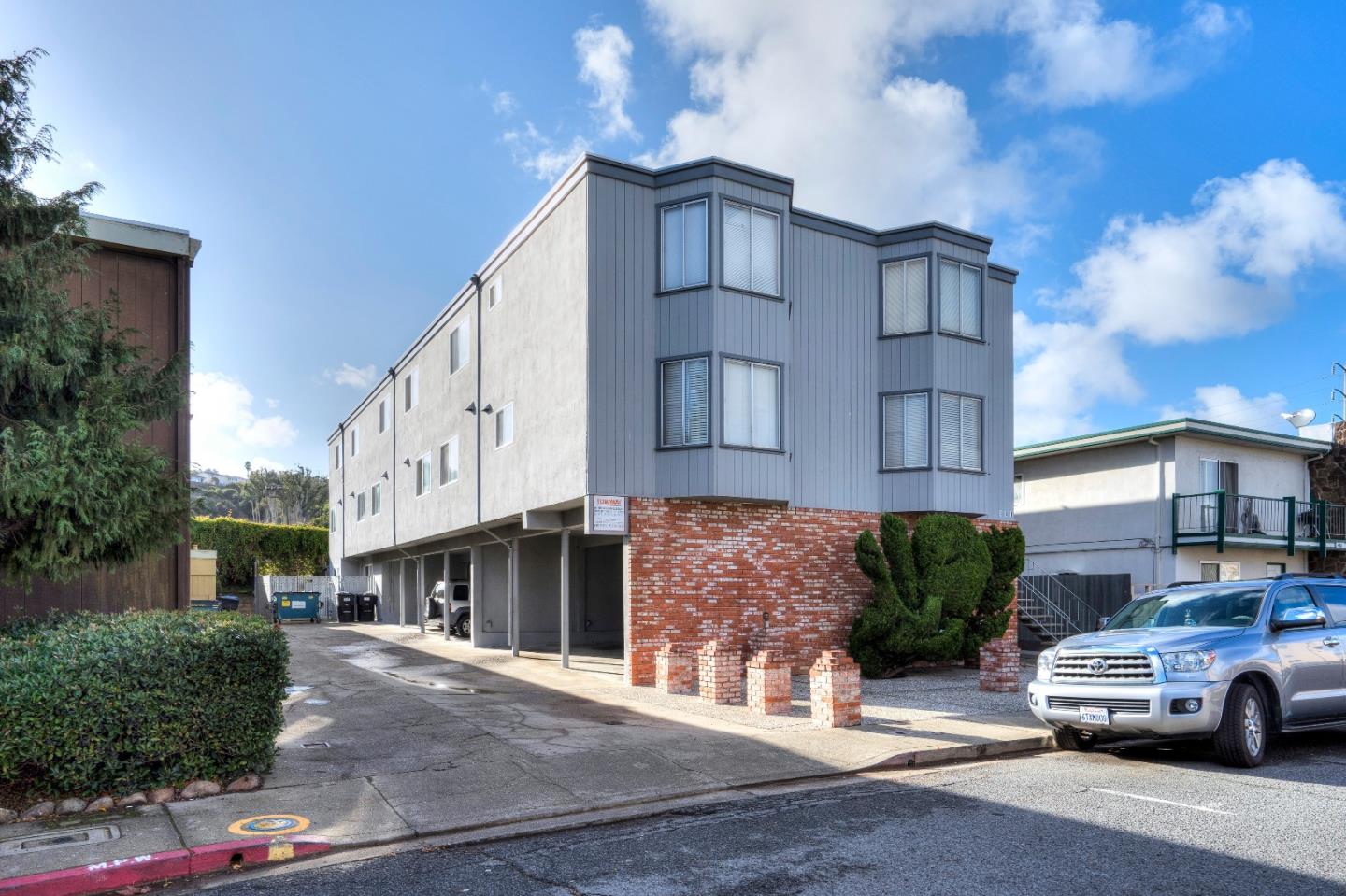 a car parked in front of a building