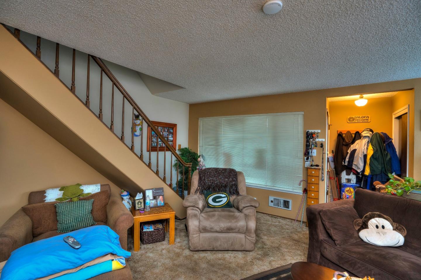 481 Lincoln Circle Millbrae, CA 94030 - Photo 12 of 24 a living room with furniture and a floor to ceiling window