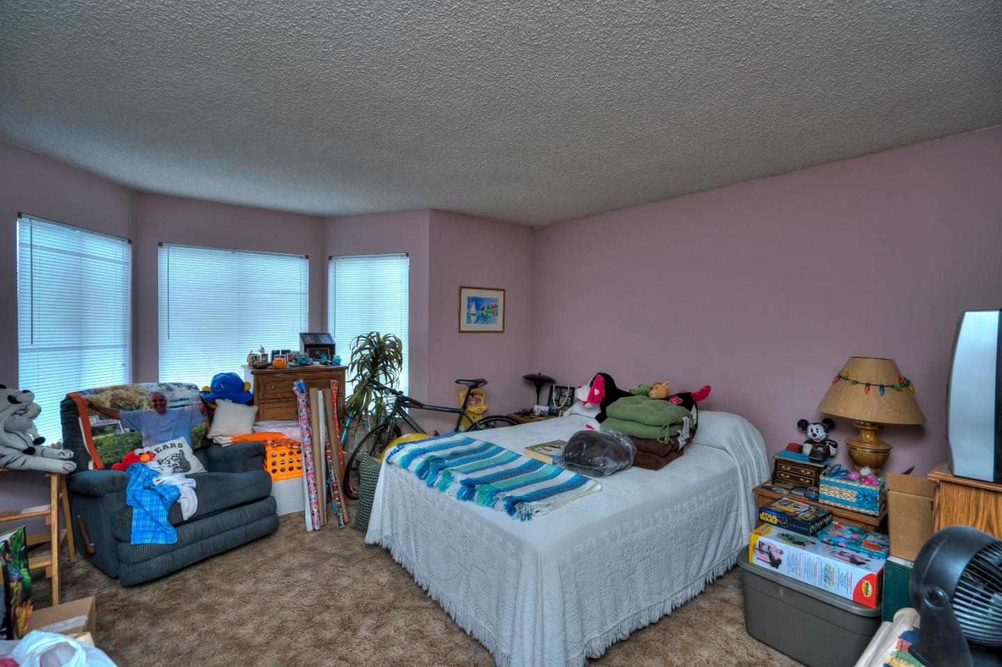481 Lincoln Circle Millbrae, CA 94030 - Photo 13 of 24 a living room with furniture and a lamp