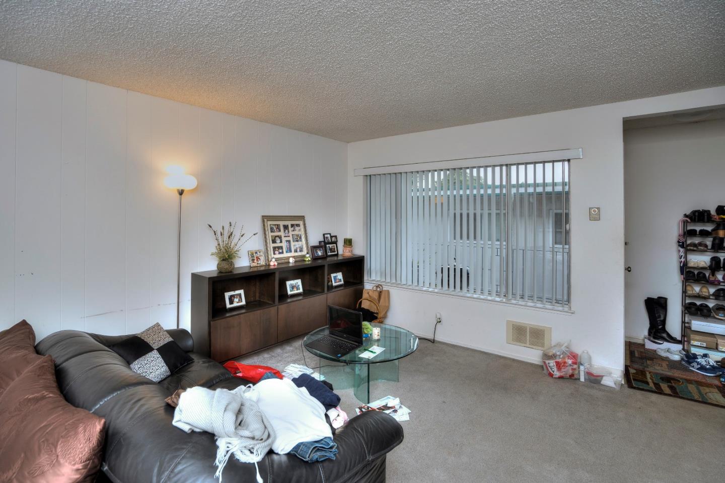 481 Lincoln Circle Millbrae, CA 94030 - Photo 6 of 24 a living room with furniture chess board and a couch