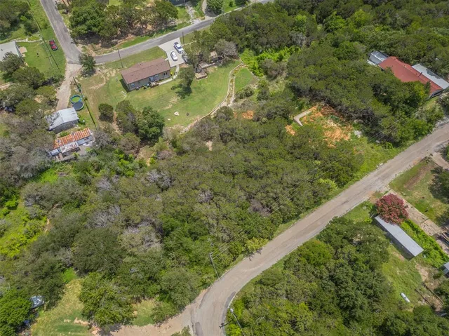 a view of swimming pool from a balcony