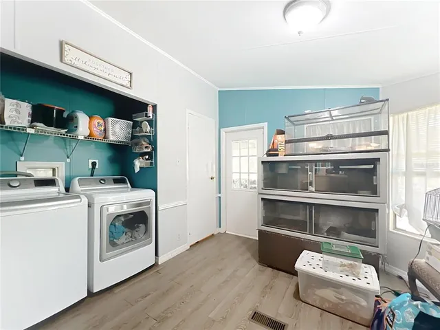 a kitchen with a stove and a microwave