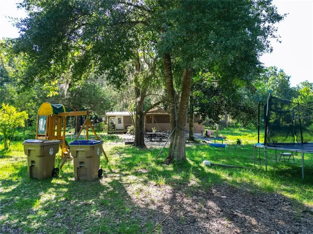 a view of a garden with a lake