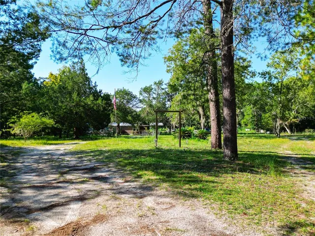 a view of a big yard with a small yard