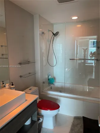 a bathroom with a sink and a toilet