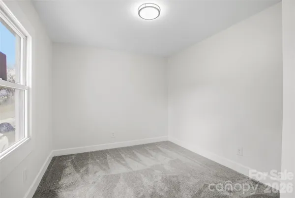 a view of a room with a window