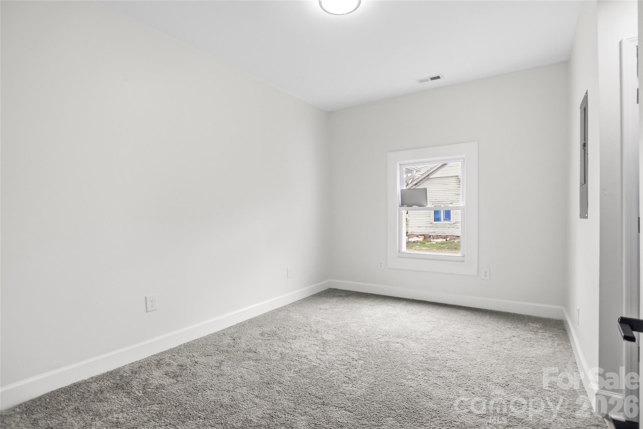 706 Sweeney Street Chester, SC 29706 - Photo 16 of 20 an empty room with windows