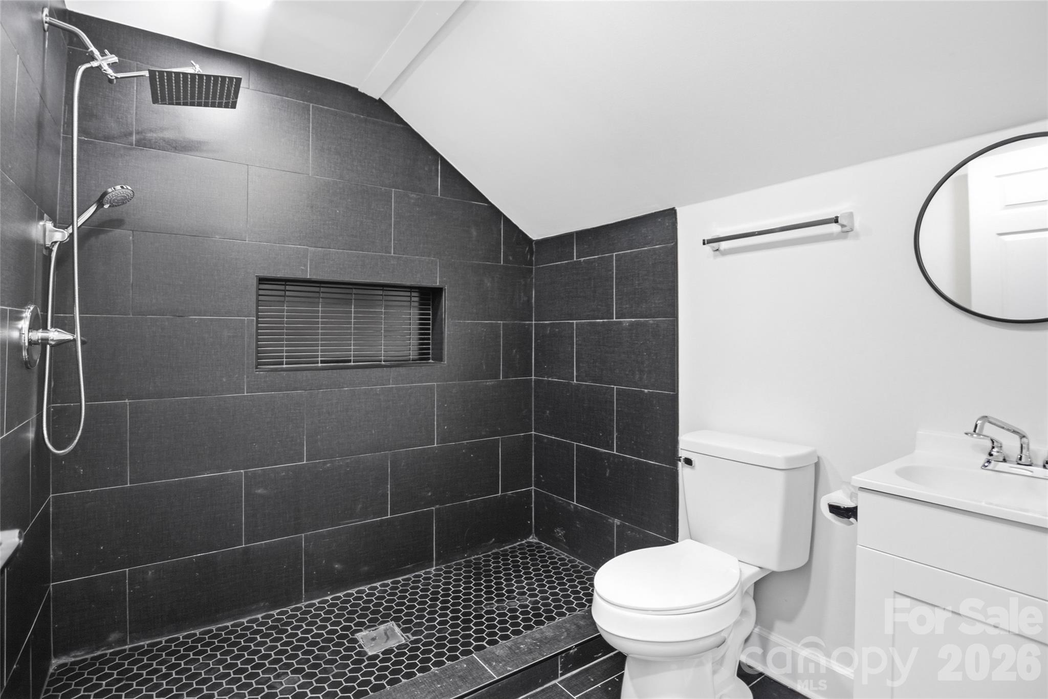 706 Sweeney Street Chester, SC 29706 - Photo 18 of 20 a bathroom with a toilet and a shower