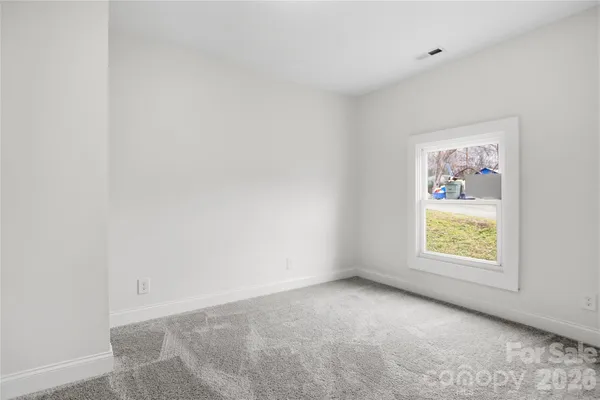 an empty room with window