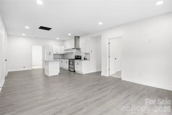 a view of kitchen with wooden floor