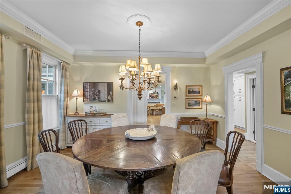 203 Heights Road Ridgewood, NJ 07450 - Photo 25 of 41 a view of a dining room with furniture window and wooden floor