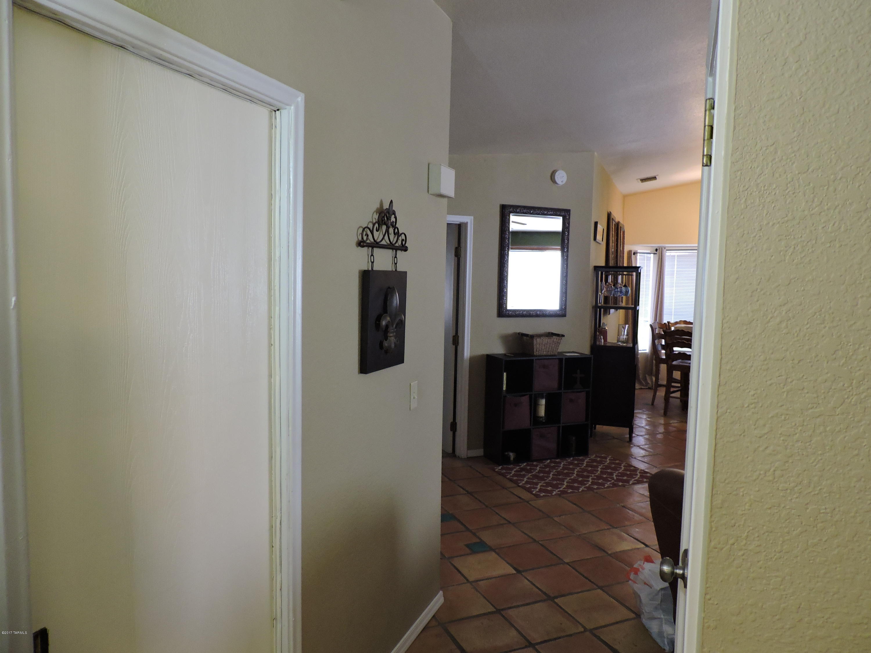 2709 West Firebrook Road Tucson, AZ 85741 - Photo 5 of 17 a view of a hallway with living room