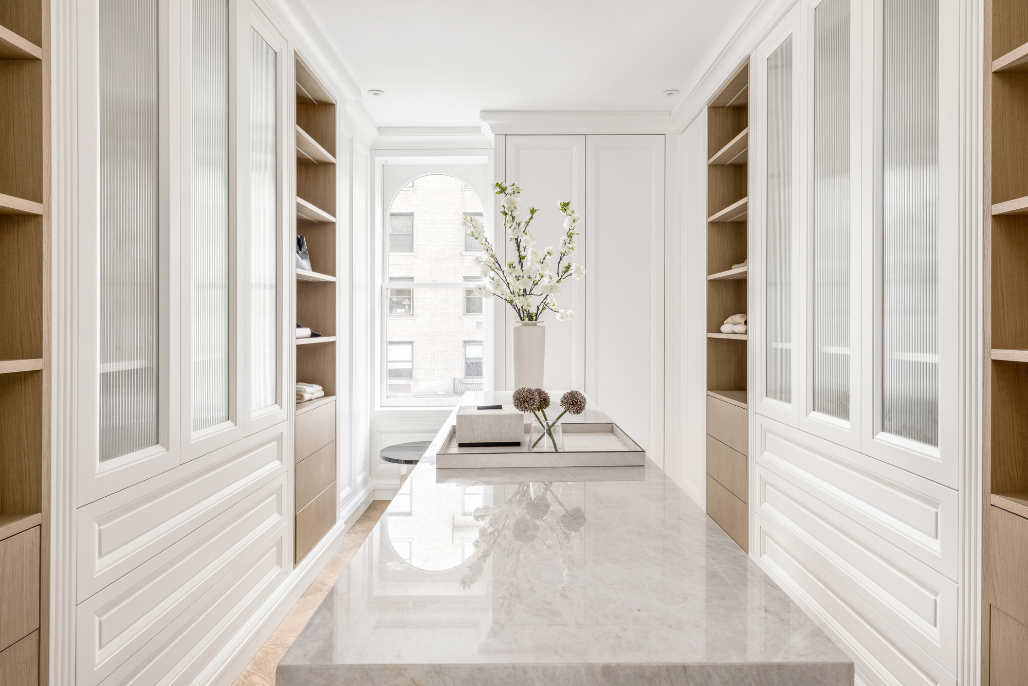 133 East 73rd Street, Unit PH Manhattan, NY 10021 - Photo 13 of 37 a living room with furniture and a large window